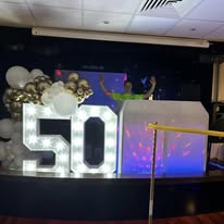 50th birthday party DJ hire in Doncaster with light-up numbers and disco booth